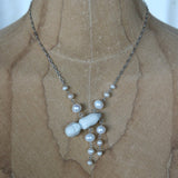 Antique porcelain doll necklace with pearls