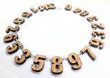 Laser-cut bamboo 21-digit pi necklace