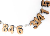 Laser-cut bamboo 21-digit pi necklace