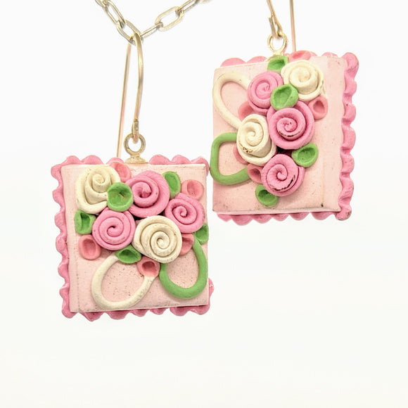 Square pink dollhouse cake earrings