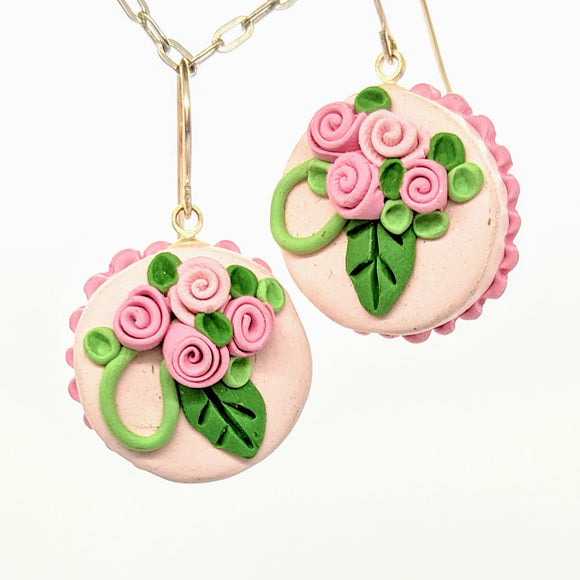 Round pink dollhouse cake earrings
