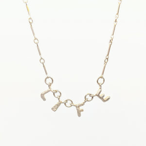 Silver alphabet soup "life" necklace