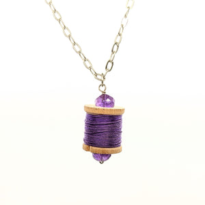 Purple vintage wooden spool necklace