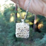 Photo of silver-plated carpet pendant hanging
