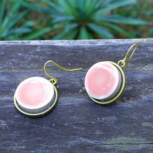 Photo of pink ceramic tile brass earrings