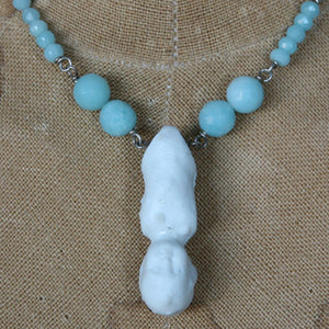 Antique porcelain doll necklace with aqua beads