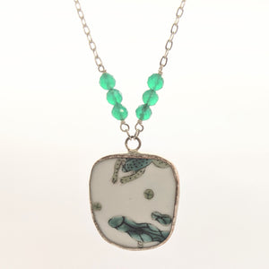 Frog and lilypad pottery necklace with green faceted beads