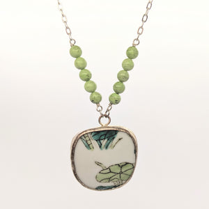 Lilypad pottery necklace with light green beads