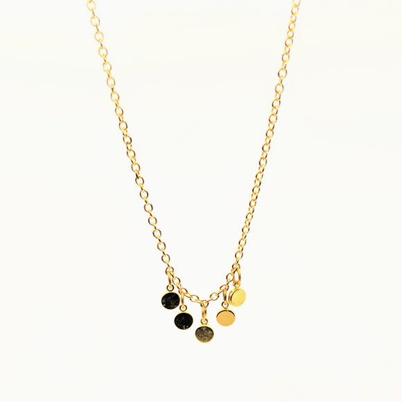 Gold disc spaced necklace