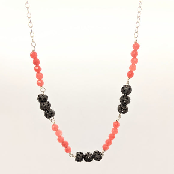 Carved bead and pink faceted stone necklace