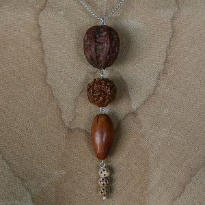 Seed pendant on sterling silver chain