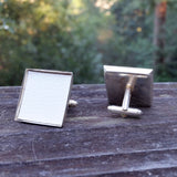 Photo of off-white silver-plated faux-leather upholstery cuff links