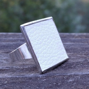 Photo of silver-plated upholstery ring, 3/4 view